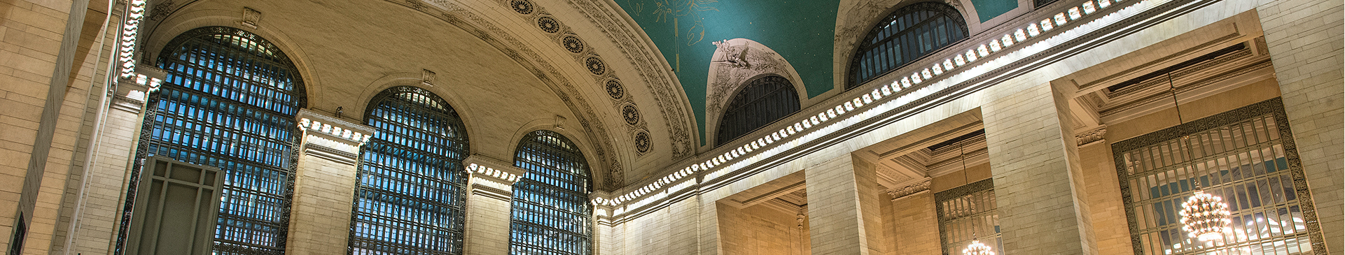 The vaulted ceiling, grand windows, and archways of Grand Central Terminal’s main hall.